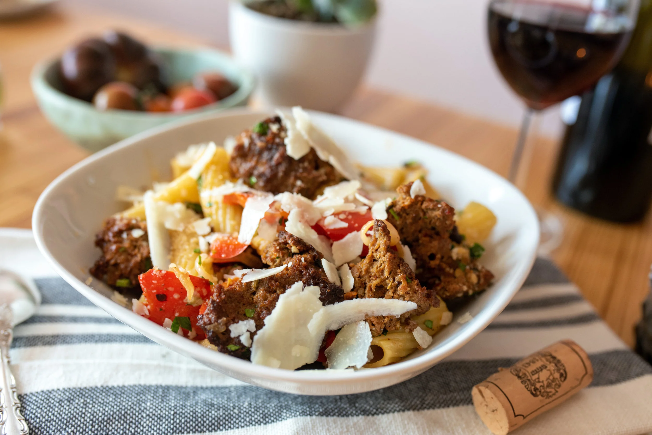 Rigatoni with homemade sausage and bell peppers, topped with shaved Pecorino Romano.