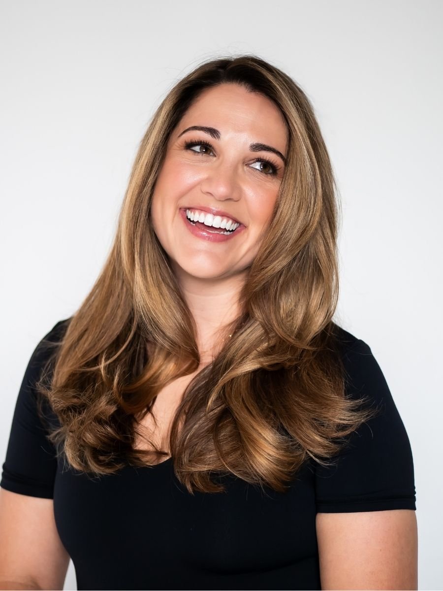 Woman with dimensional blonde balayage hair at Spoleti Salon in Austin, Texas