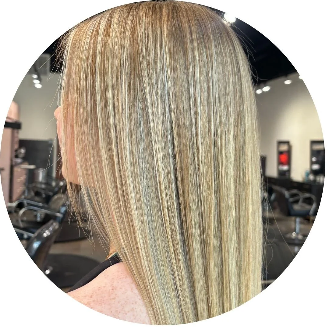 Blonde hair with highlights on a person sitting in a salon chair at Spoleti Salon in South Austin.