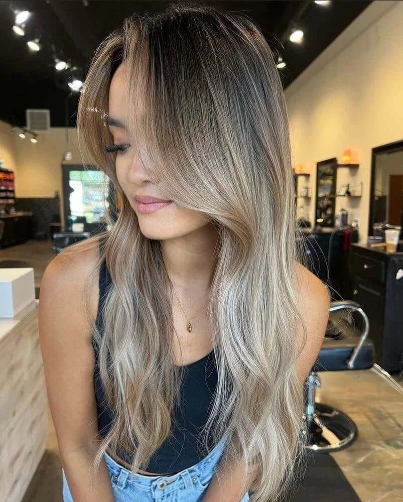 Lived-in blonde hair color by Spoleti Salon in Austin and Pflugerville, TX