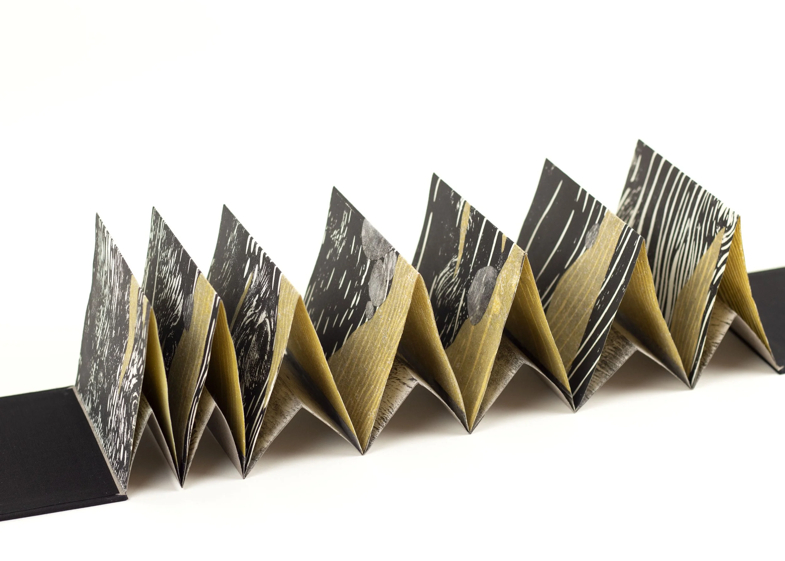 Worry stones for those not often thought of

2021
Closed: 5 in x 4.5 in x 0.75 in Open: 5 in x 27 in x 4.5 in
chine collé, woodcut, monoprint
