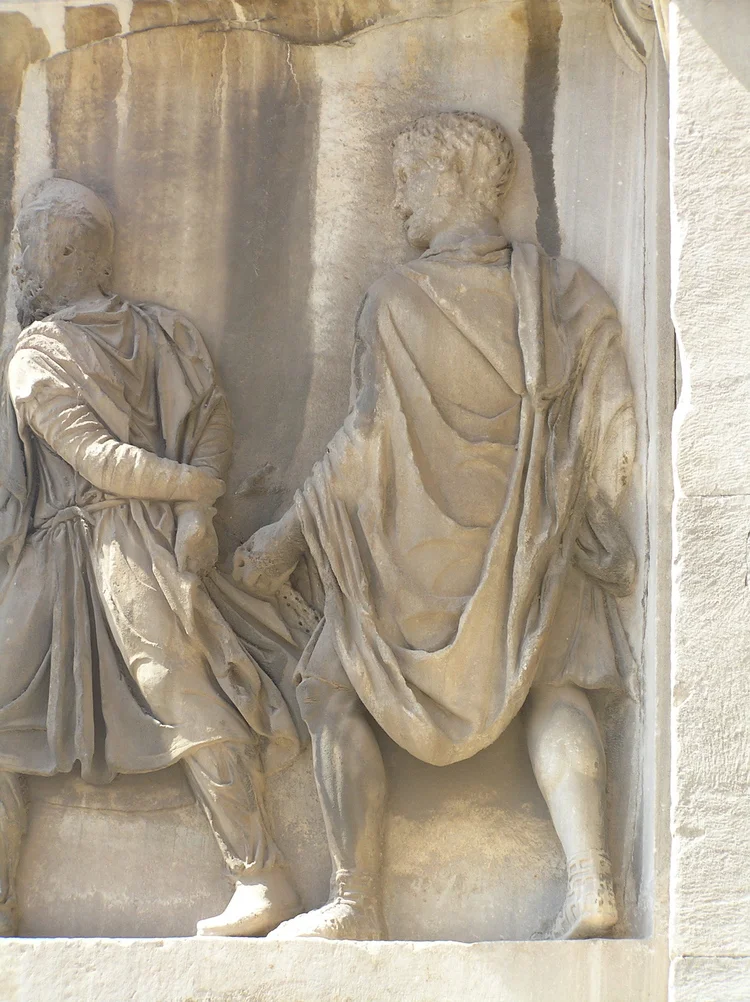 Fig. 1.20: Parthian prisoner of a Roman soldier, Arch of Septimius Severus. Rome.