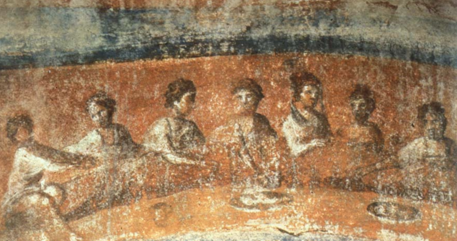 Fig. 2.18: Fresco from the Catacomb of Priscilla, Rome. 2nd-3rd century CE. In this depiction of the Eucharist, the participants may well be women, which would have been contrary to view of many Church Fathers.