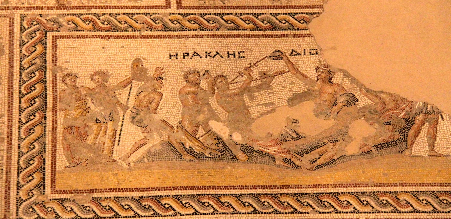 Fig 4.18: Floor mosaic from the Tzippori synagogue, Sepphoris. 5th century. The entire floor of the synagogue is covered with mosaics depicting scenes from both the bible and the Greek mythology. This scene depicts the divine hero Heracles (Roman He…