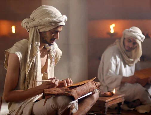 Reenactment photograph of ancient scribal students.