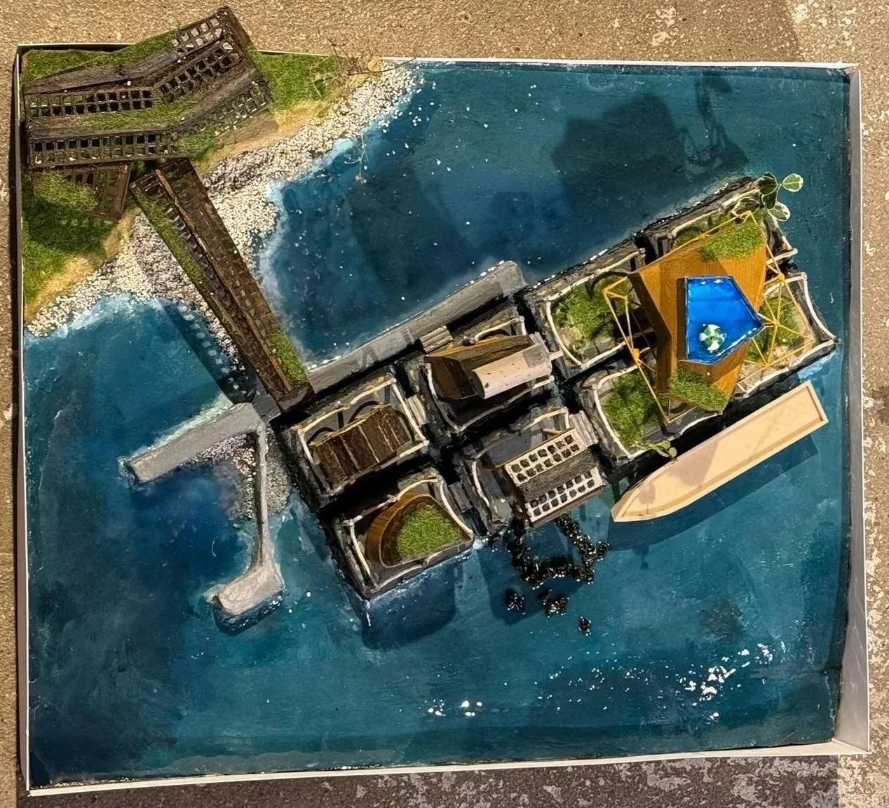 Architectural Model of the proposed design for a network of modular barge units accessible through the pier in Barking Riverside.