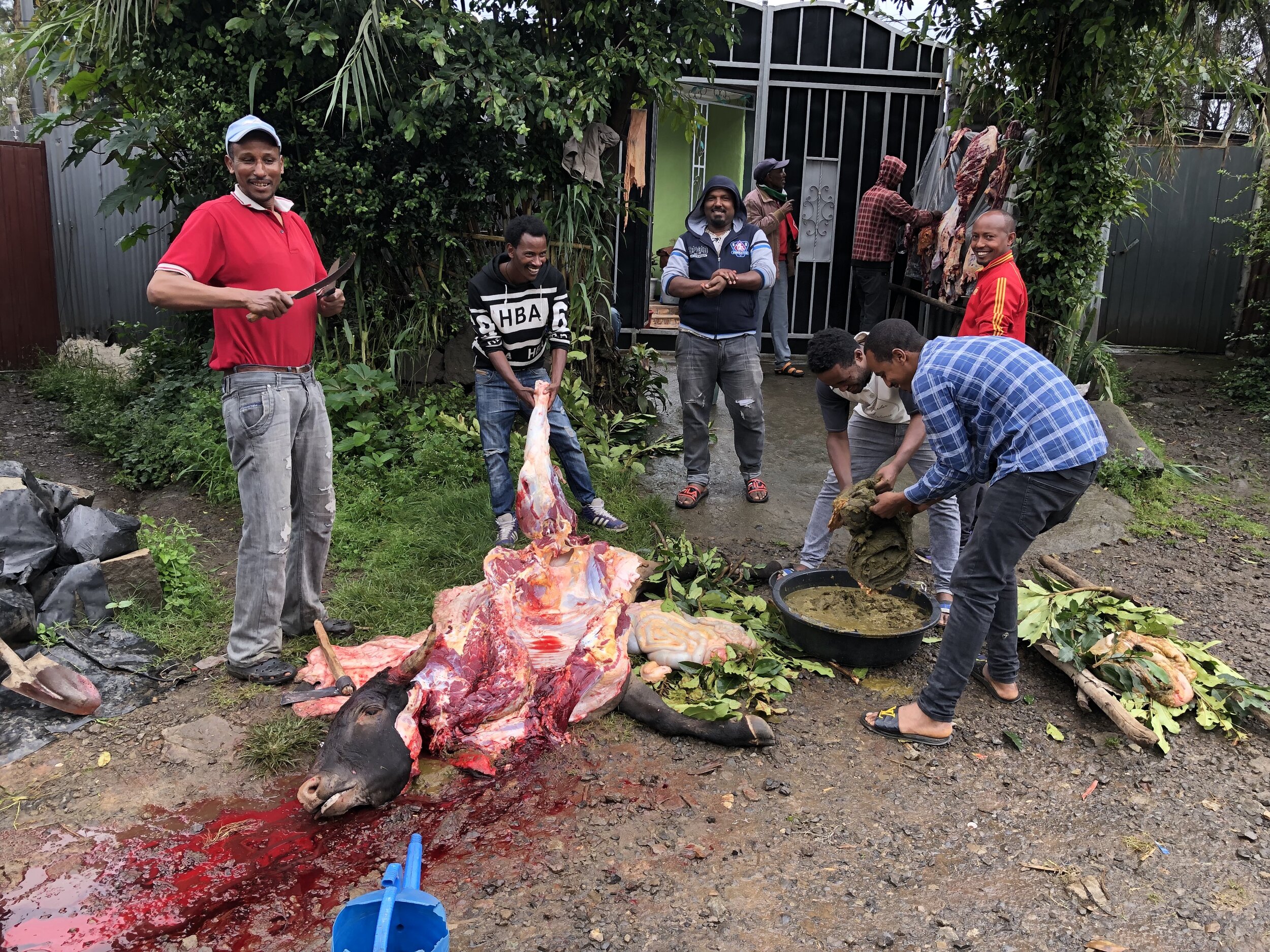 The man in the red shirt was the lead butcher when we got there.