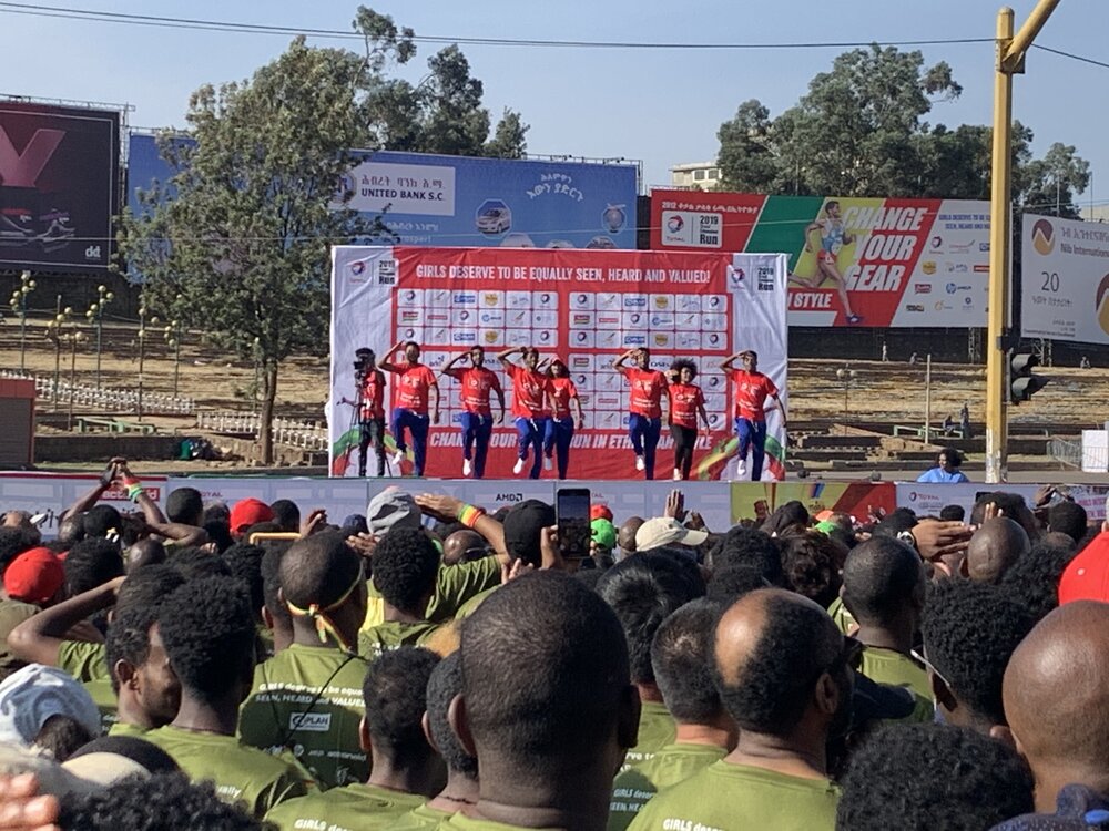 The pre-race dance routine being led by a squad of the elevated and motivated.