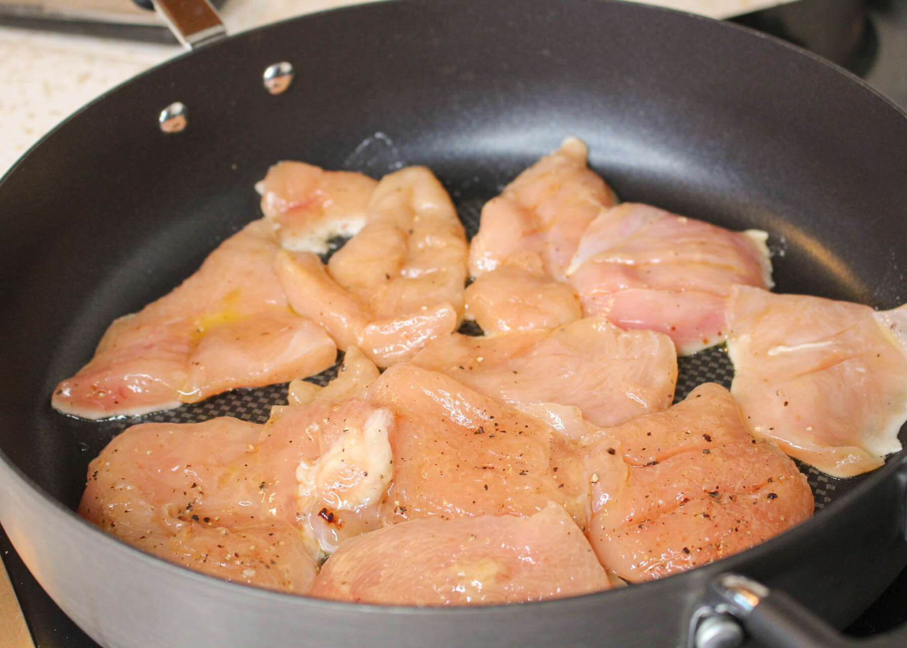 Place chicken into skillet, medium high heat
