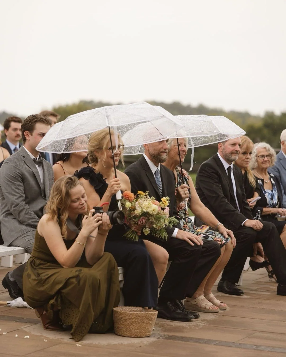 Some of my favorite weddings have happened under umbrellas and over puddles. Worried about rain on your wedding day? Our advice is to have a plan for it and embrace it. Rain has a way of slowing everything down and making the day feel intimate and ci