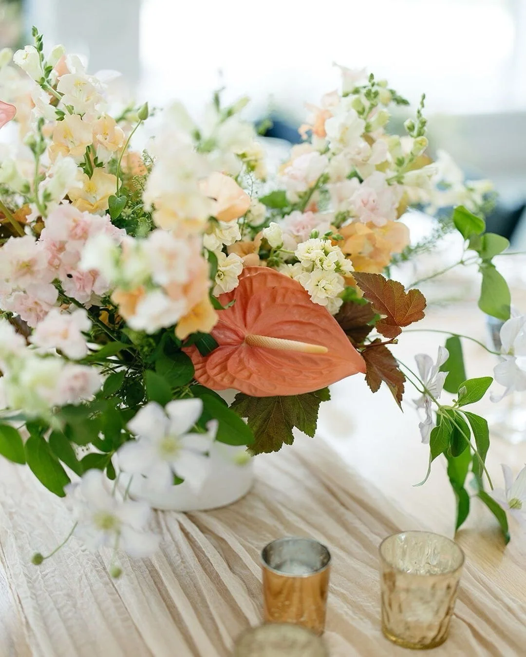 My take on color? Go bold, go seasonal, and let your palette do the talking.
Neutral venues are the perfect blank canvas&mdash;your florals and overall design get to shine without competing for attention. And sure, white-on-white is a timeless classi