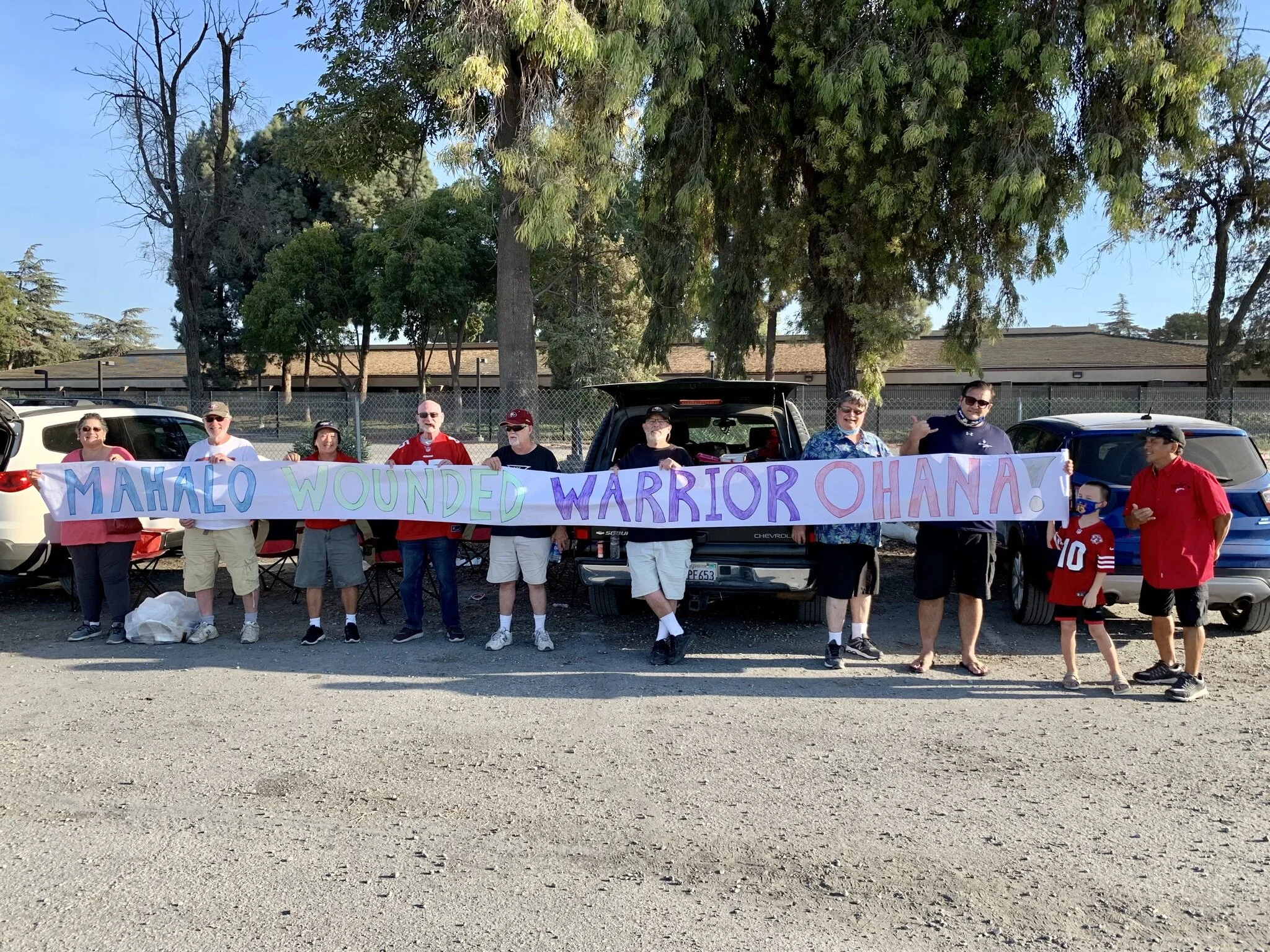 The Stremel family presented this wonderful banner to Wounded Warrior Ohana at the pre-game tailgate party.  What a nice way to show appreciation!