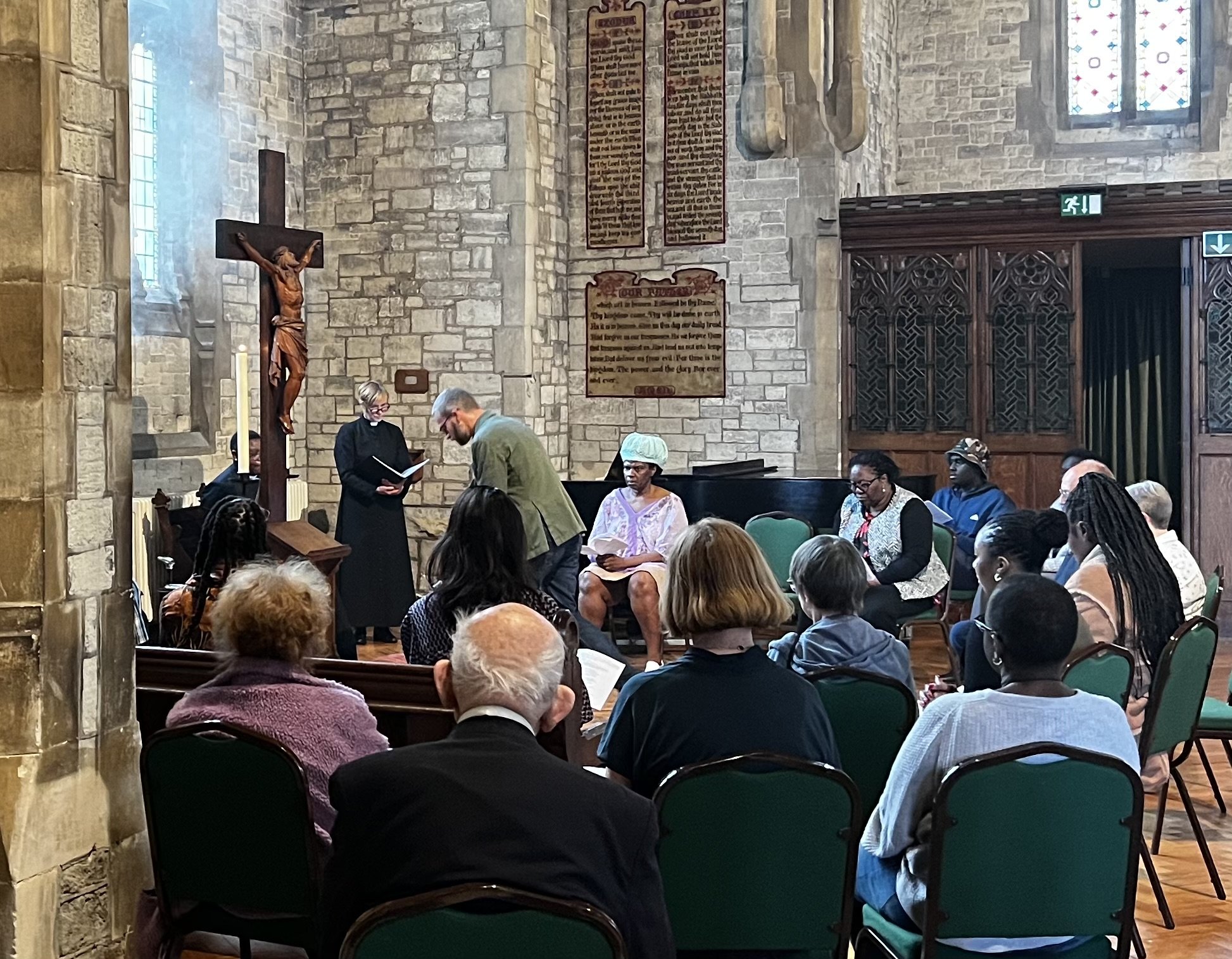  We gather at the cross to remember the events of Good Friday. 