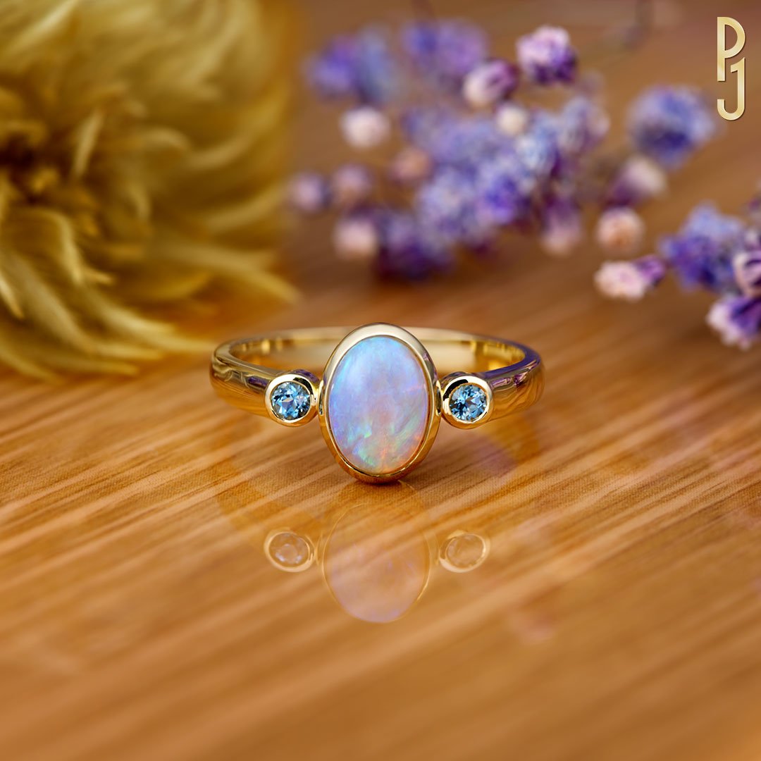 Custom Designed Engagement Ring White Opal Aquamarine Yellow Gold Philip's Jewellery Mackay.jpg