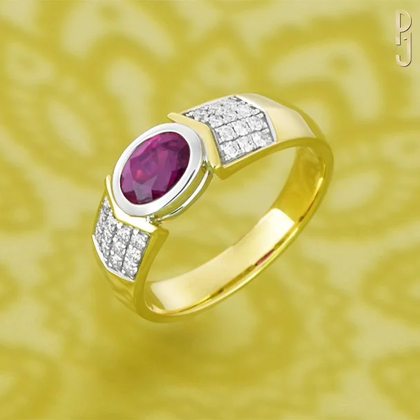  Ruby: Burmese, Oval, 1.06ct  Diamonds:  RBC, 24 = 0.20cts, G SI  Setting: Bezel, Pavé  Metal: 18ct Yellow Gold, 18ct White Gold 