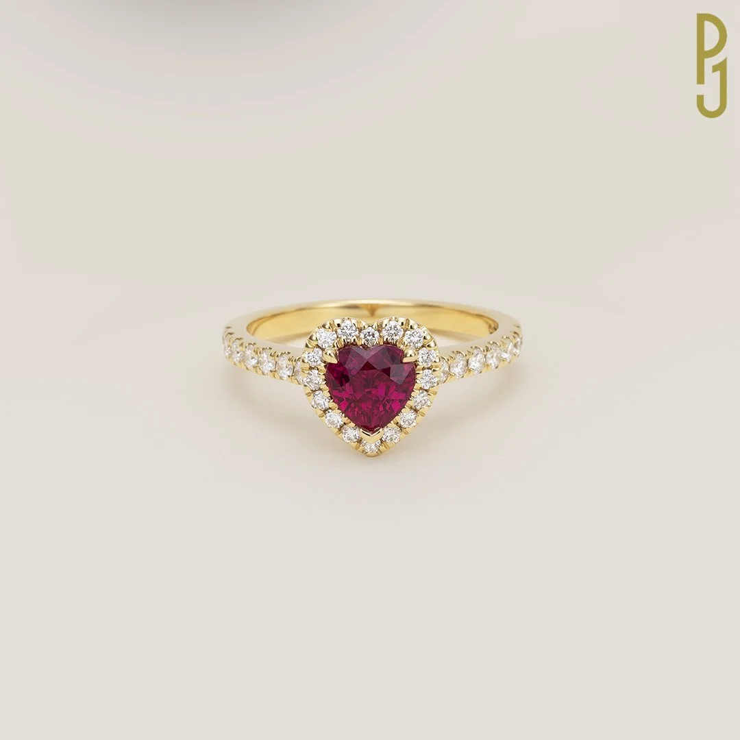  Ruby: Burma (Mong Hsu), Bright Pinkish Red, Heart, 1.10ct  Diamonds: RBC 30 = 0.44cts, F VS  Setting: Claw  Metal: 18ct Yellow Gold   Designed and handcrafted by Philip 