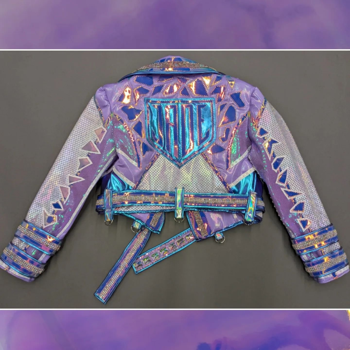 I absolutely love how this jacket and gear for @jadecargill turned out! The mix of fabrics and trims is absolutely stunning in person and I am just so pleased with it!! Scroll through for some close up shots of the details! 
💜🤍💜
@wwe #wwe #jadecar