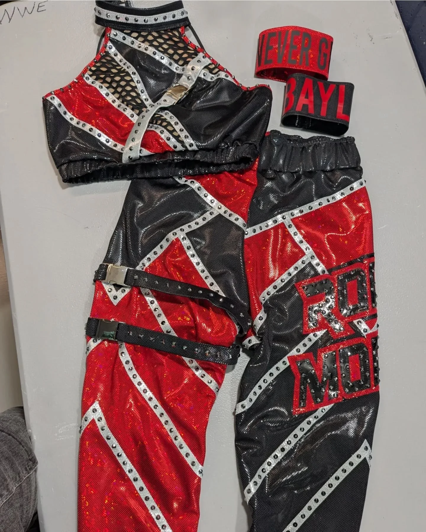 I wasn't able to get great photos of this since it was made at the last minute. But the red and black colors were a tribute to the original @johncena gear!  So happy with how it turned out for @itsmebayley !
❤️🖤
#wwe @wwe #bayley #johncena #NeverGiv
