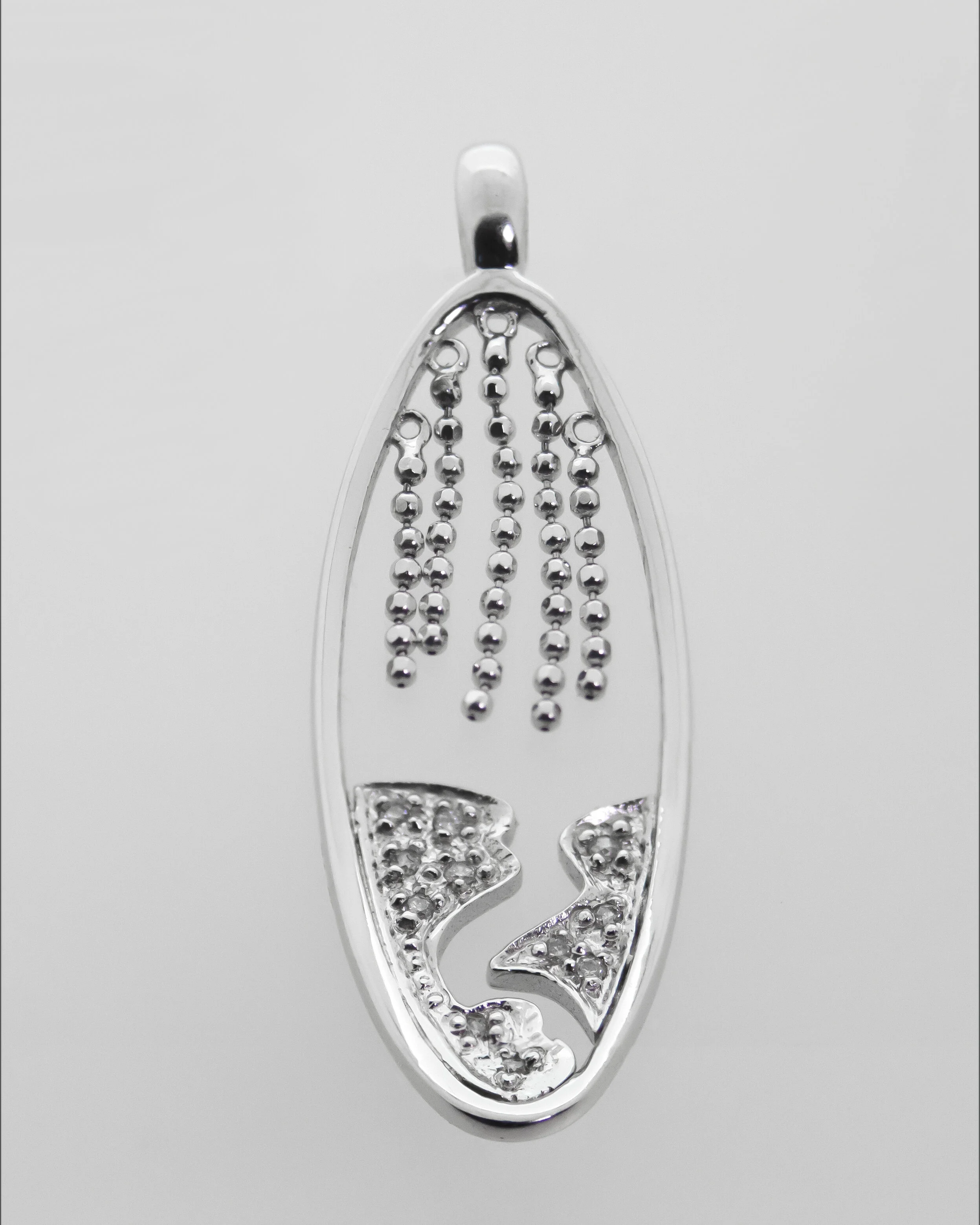 18K White Gold Oval Diamond Studded Pendant With Metal Tassels £220