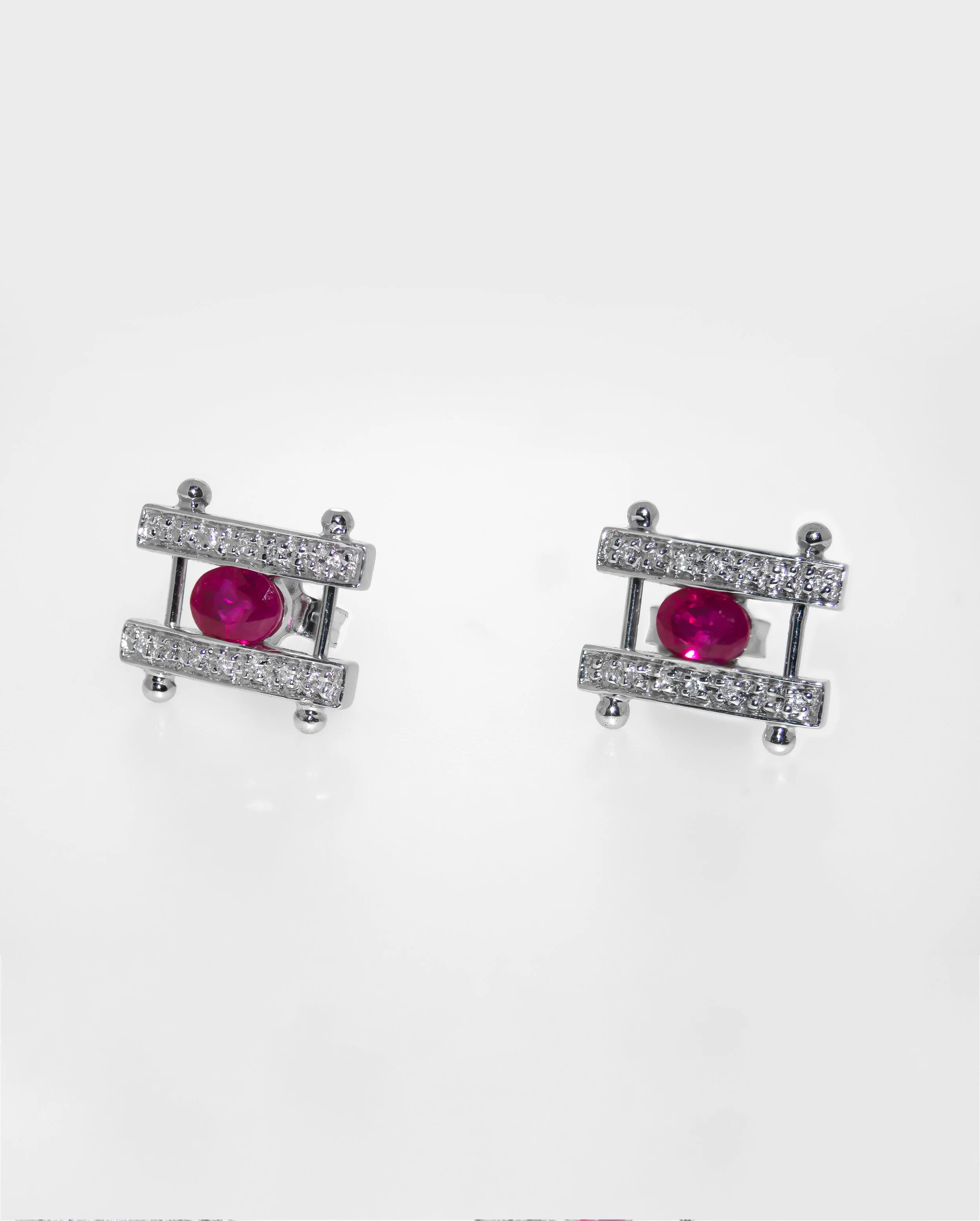 18K White Gold Ruby and Diamond Ear Studs £450