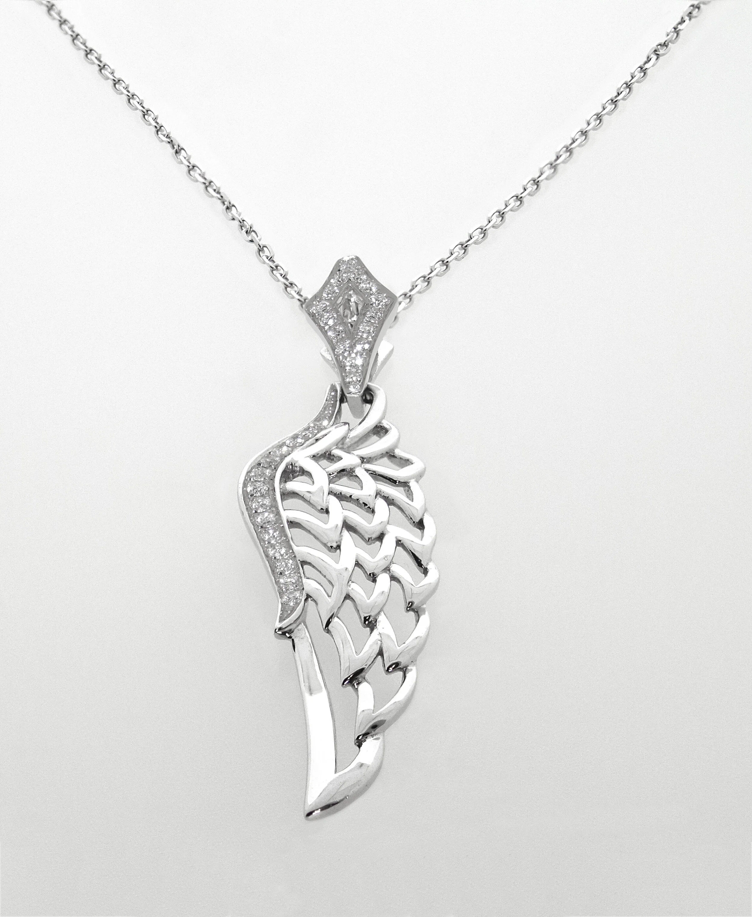 18K White Gold and Diamond Wing Shaped Pendant Necklace £680