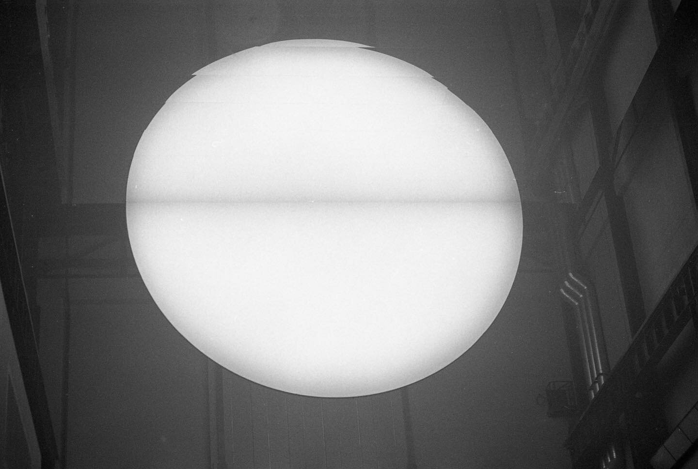 This week I processed B/W film I took 20 years ago of @studioolafureliasson &lsquo;The weather project&rsquo; 2003 @tate 

A huge orange misty glowing orb hovered near the ceiling of the Turbine hall (Pic no.1)

What&rsquo;s behind the Sun? (Pic no.2