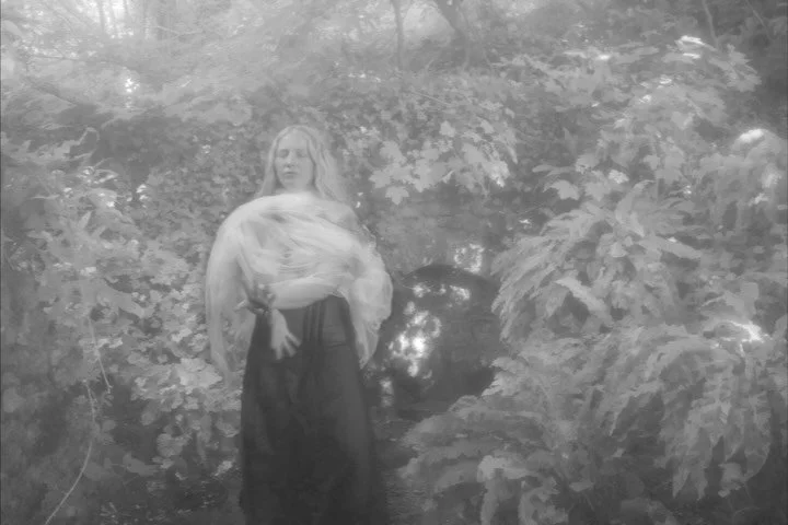 Portrait of Lilith at St. Aldhelm&rsquo;s Well &mdash; from a photoshoot around this time last year. 
A symbolic moment with my dear friend and fellow artist Lilith @lilithpiperdrawings standing barefoot in an ancient spring. The sacredness of the pl