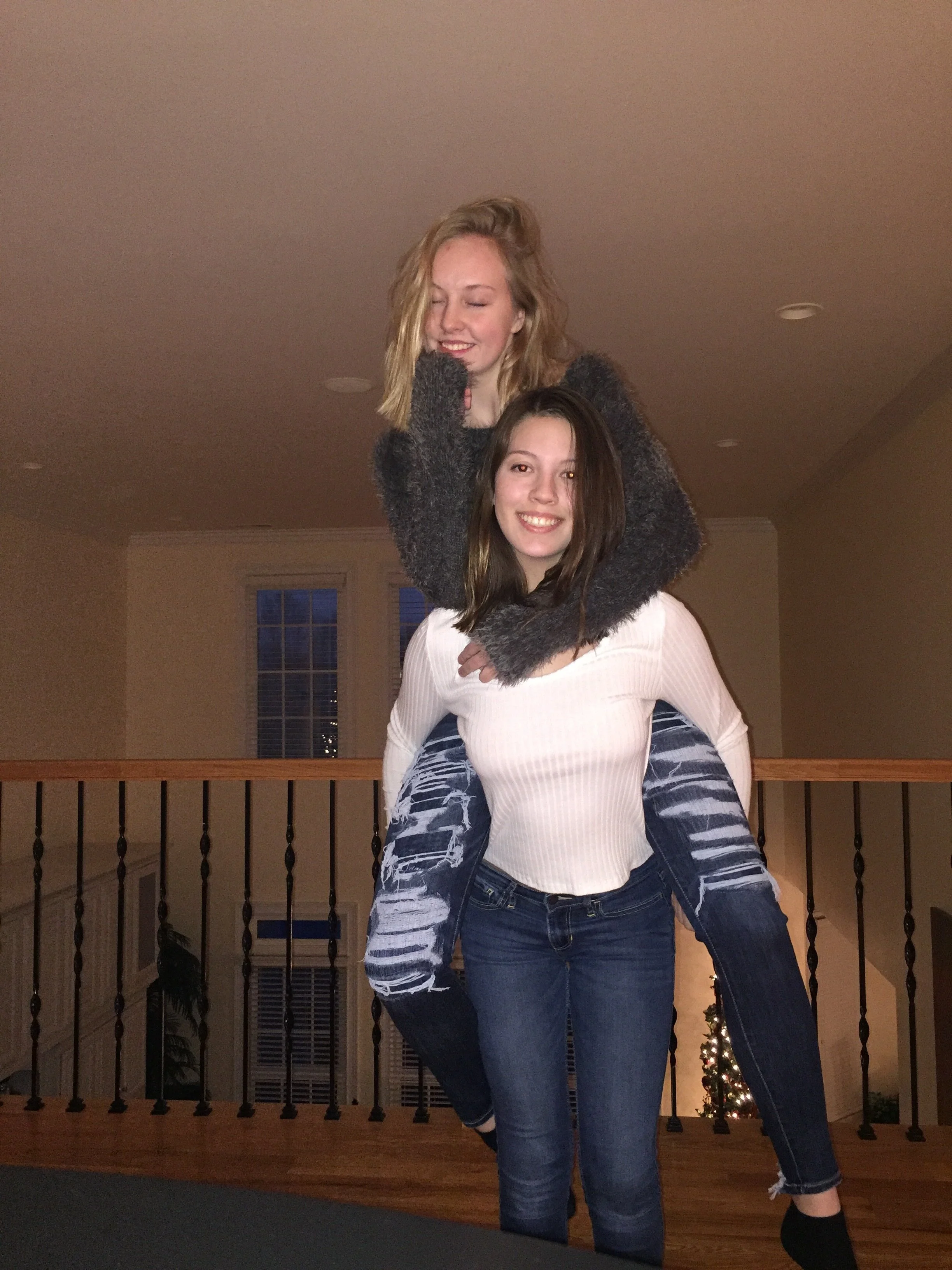 girls h on a back.JPG