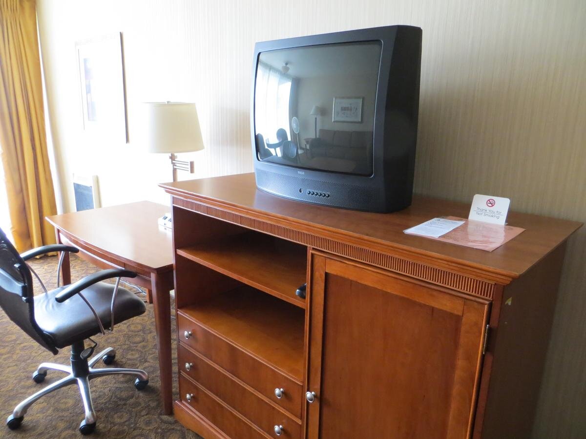 Desk and TV at Royal Pacific