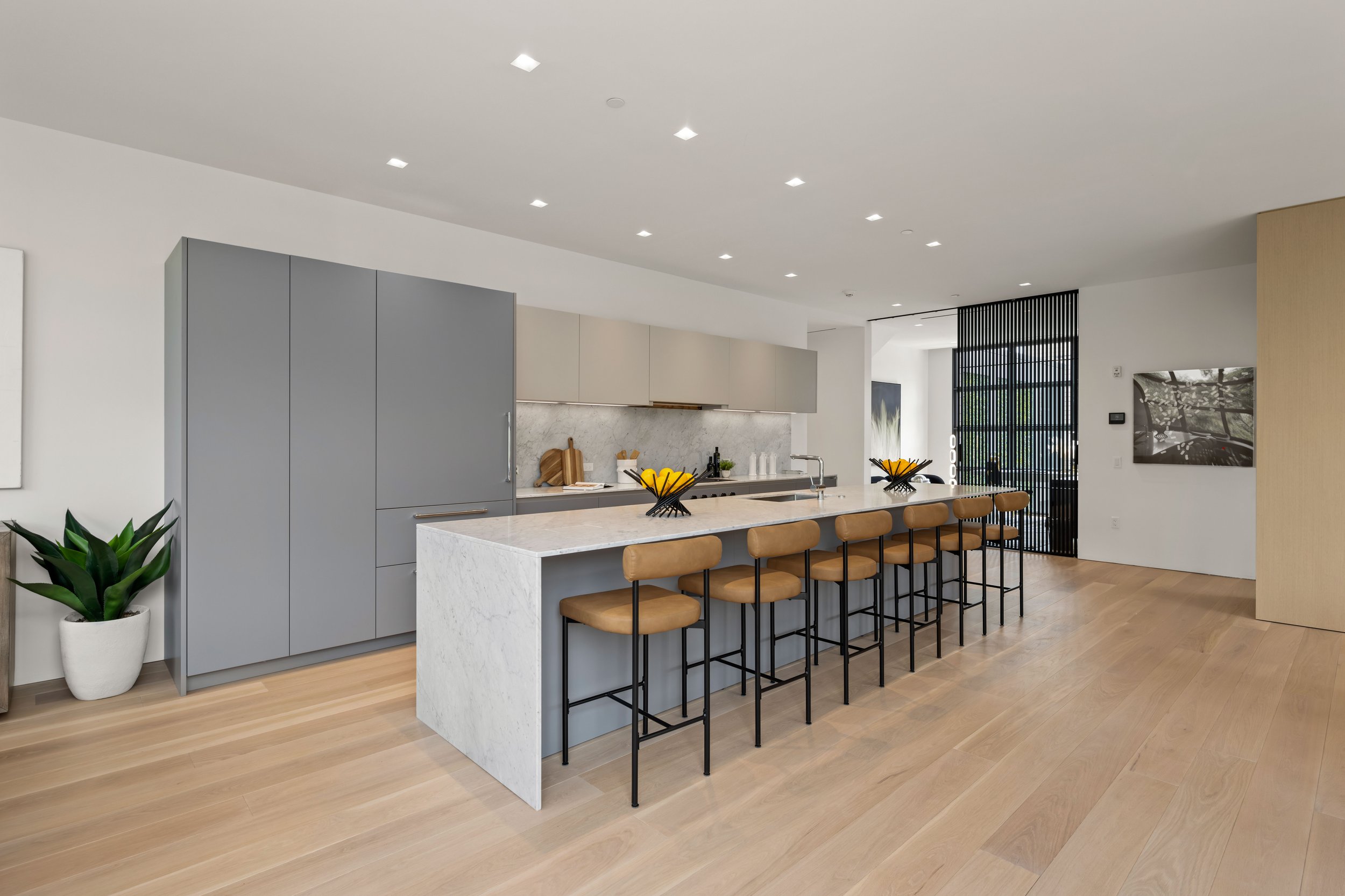 Kitchen with spacious island at Bankside Model Unit -10.jpg