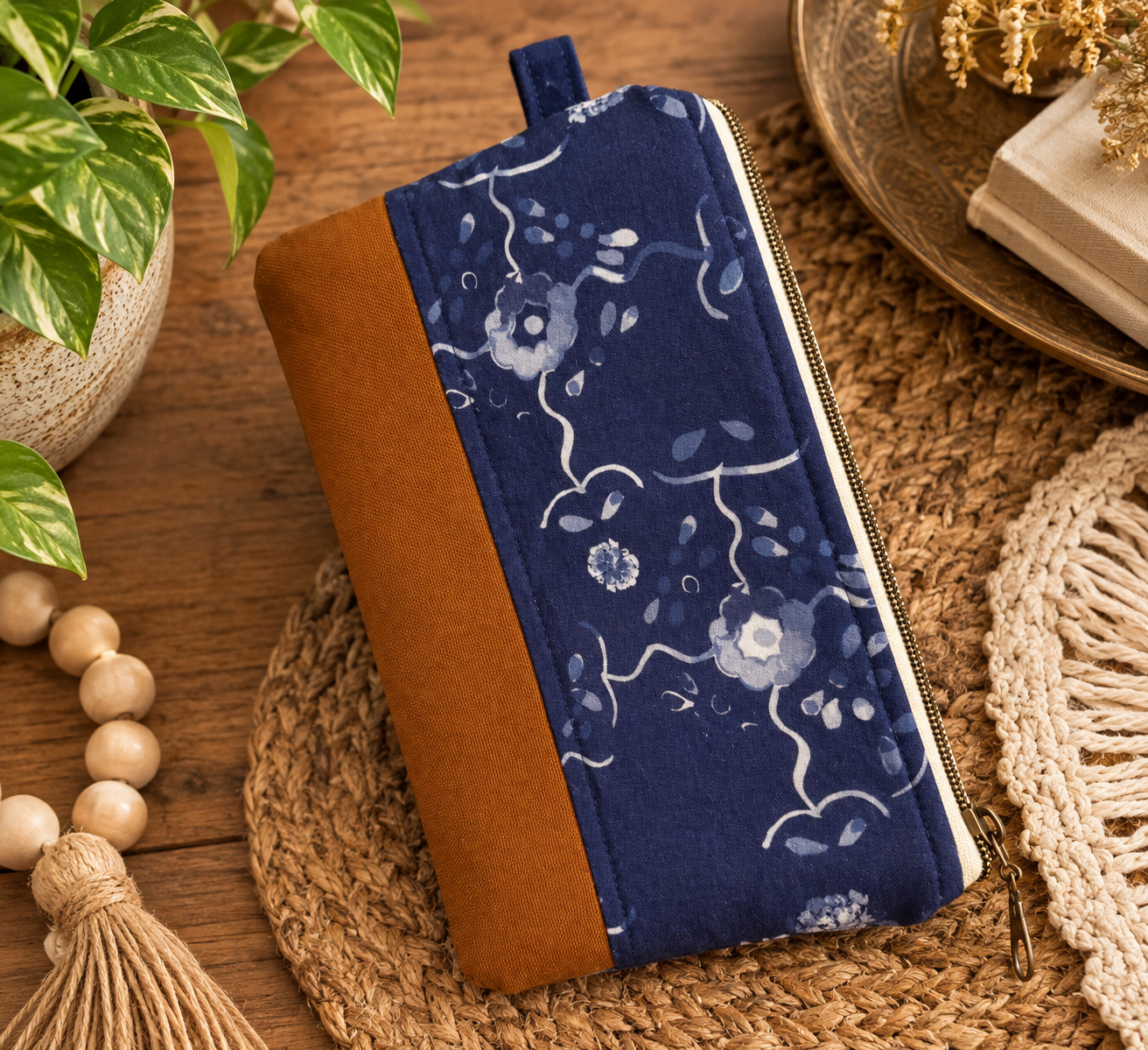 Boho Navy Floral Wristlet on Woven Mat.png