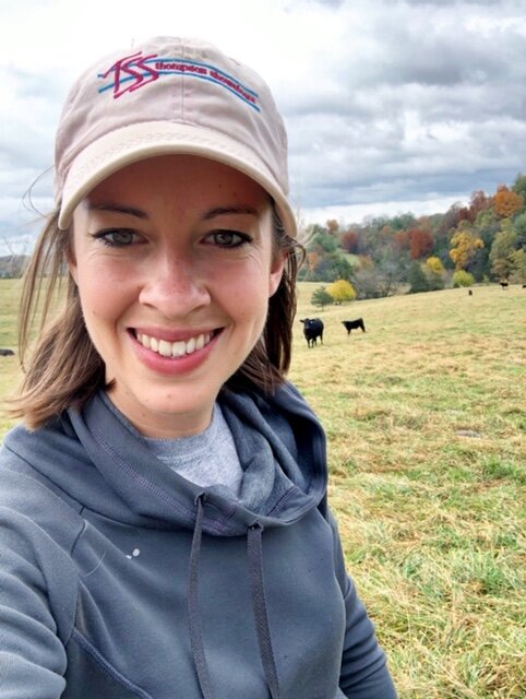 Elaine with fall cattle & leaves.JPG