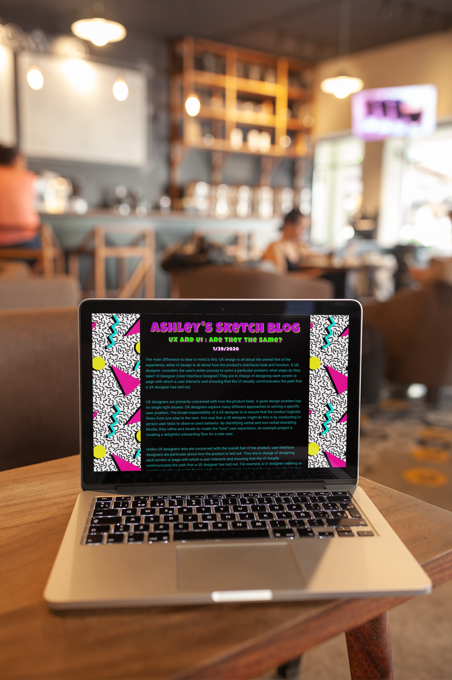 macbook-mockup-standing-on-the-corner-of-a-wooden-table-a20998.png