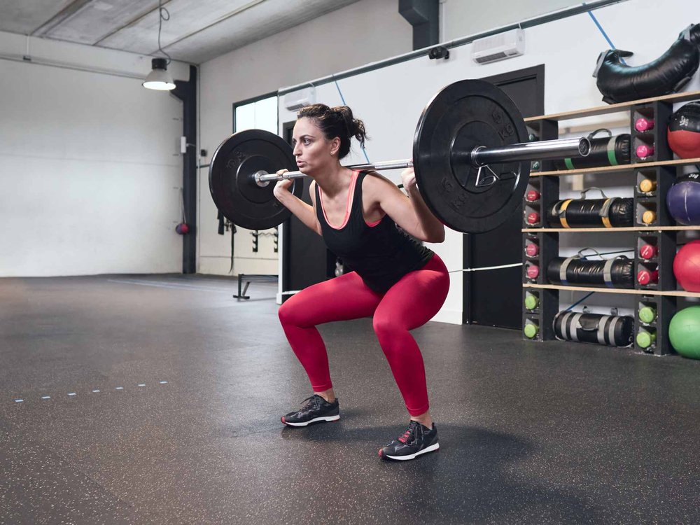 woman_working_out_in_home_garage_gym.jpg