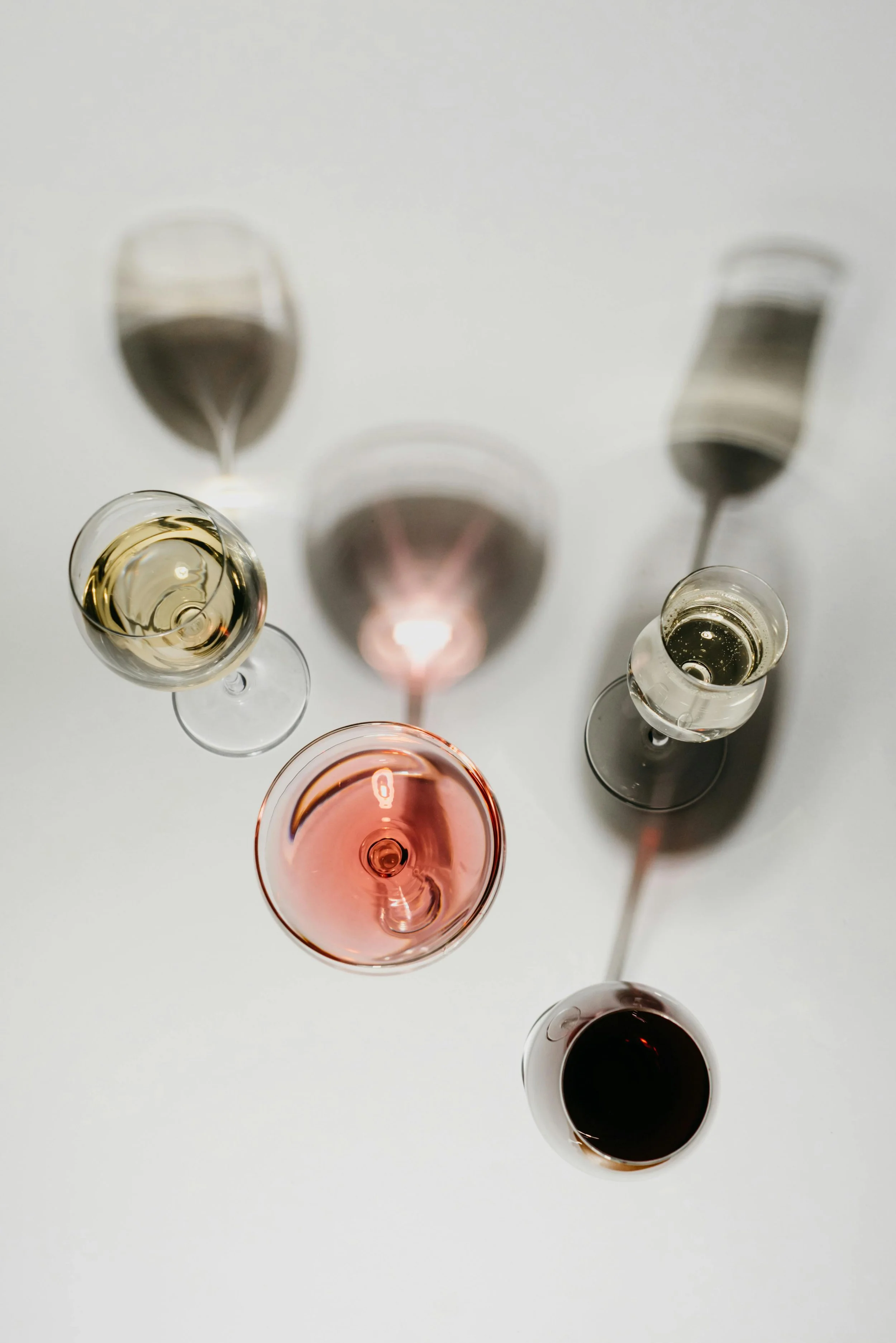 An array of wines in glasses by polina kovaleva