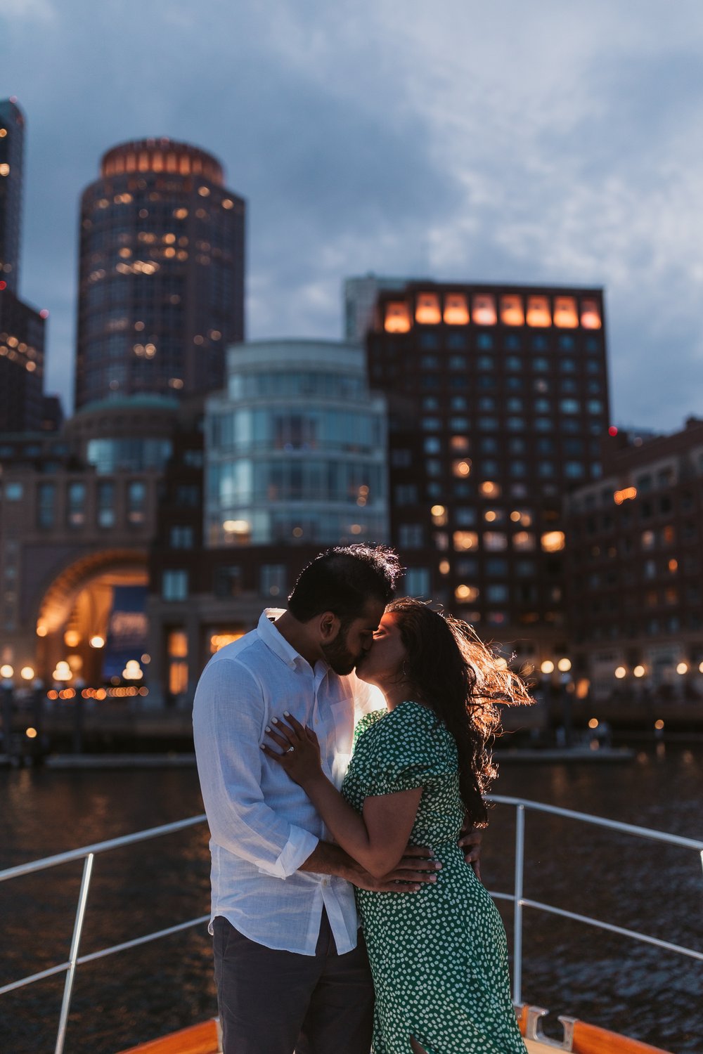 engaged-couple-night-portrait-by-boston-harbor.jpg
