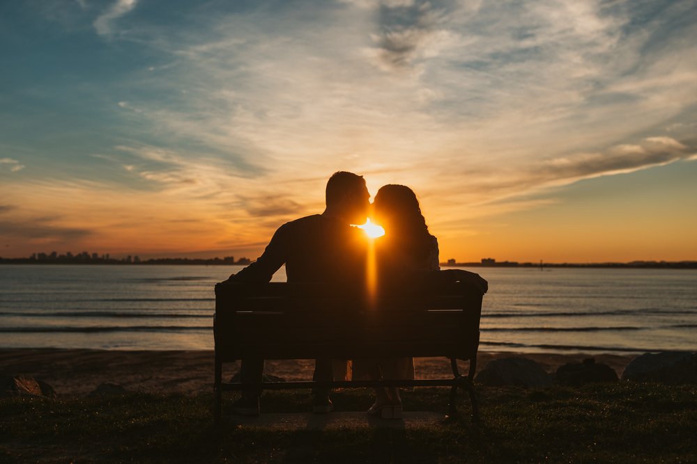 sunset-engaged-couple-portrait-by-beach.jpg