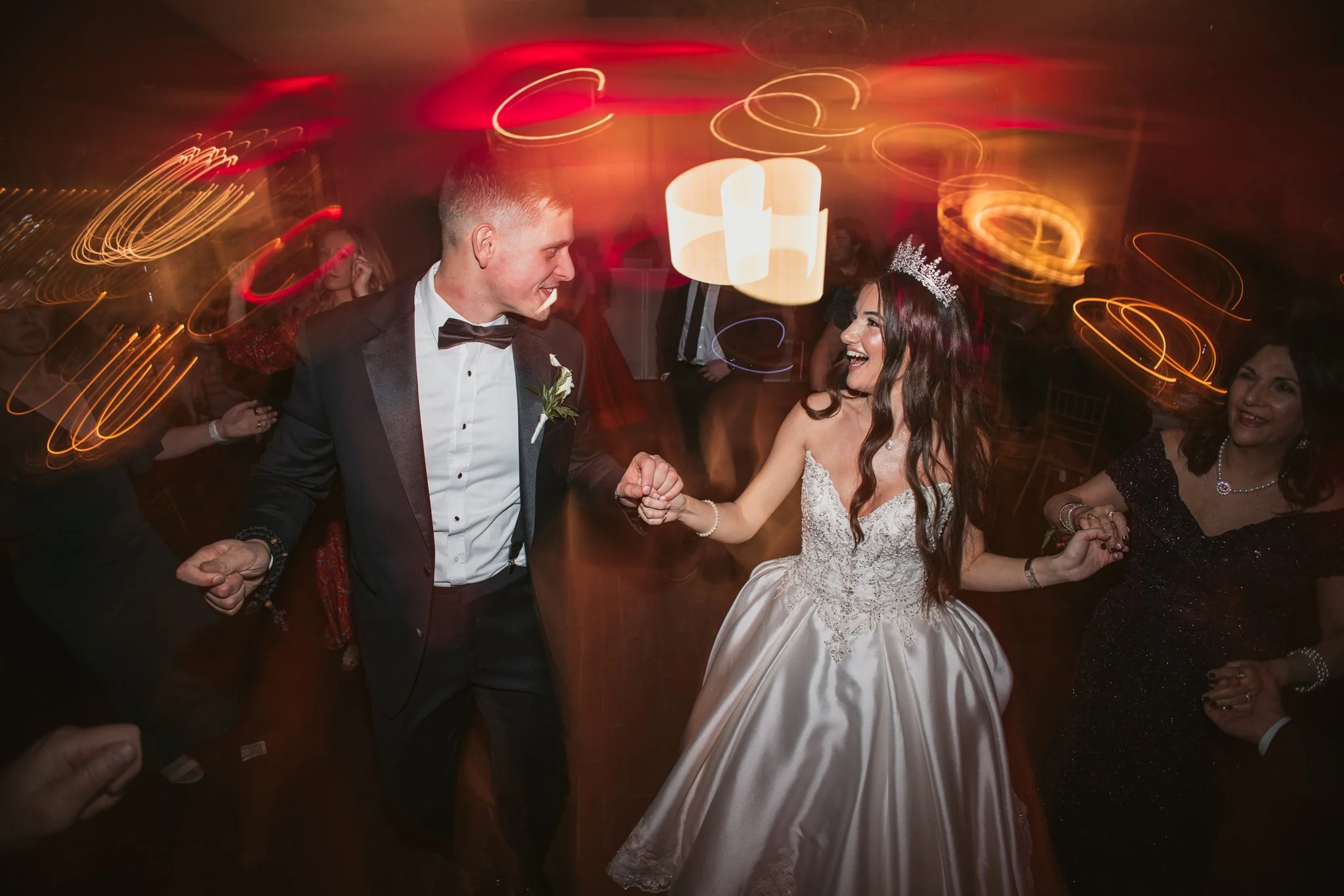 bride and groom dancing in cruiseport gloucester reception