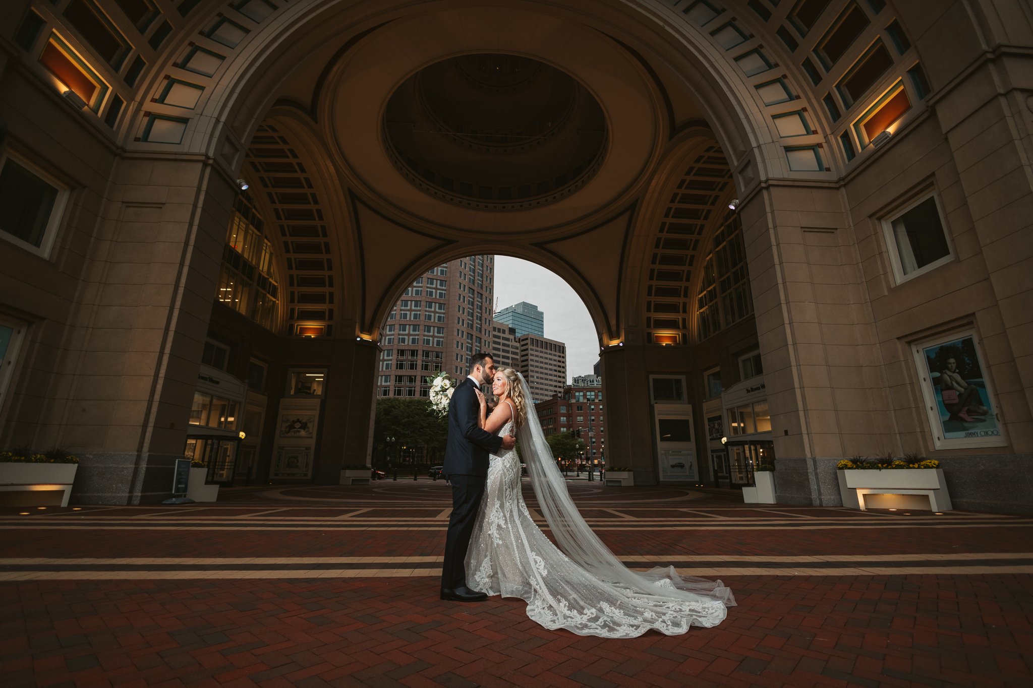 Night wedding portrait under the Boston Harbor Hotel archway