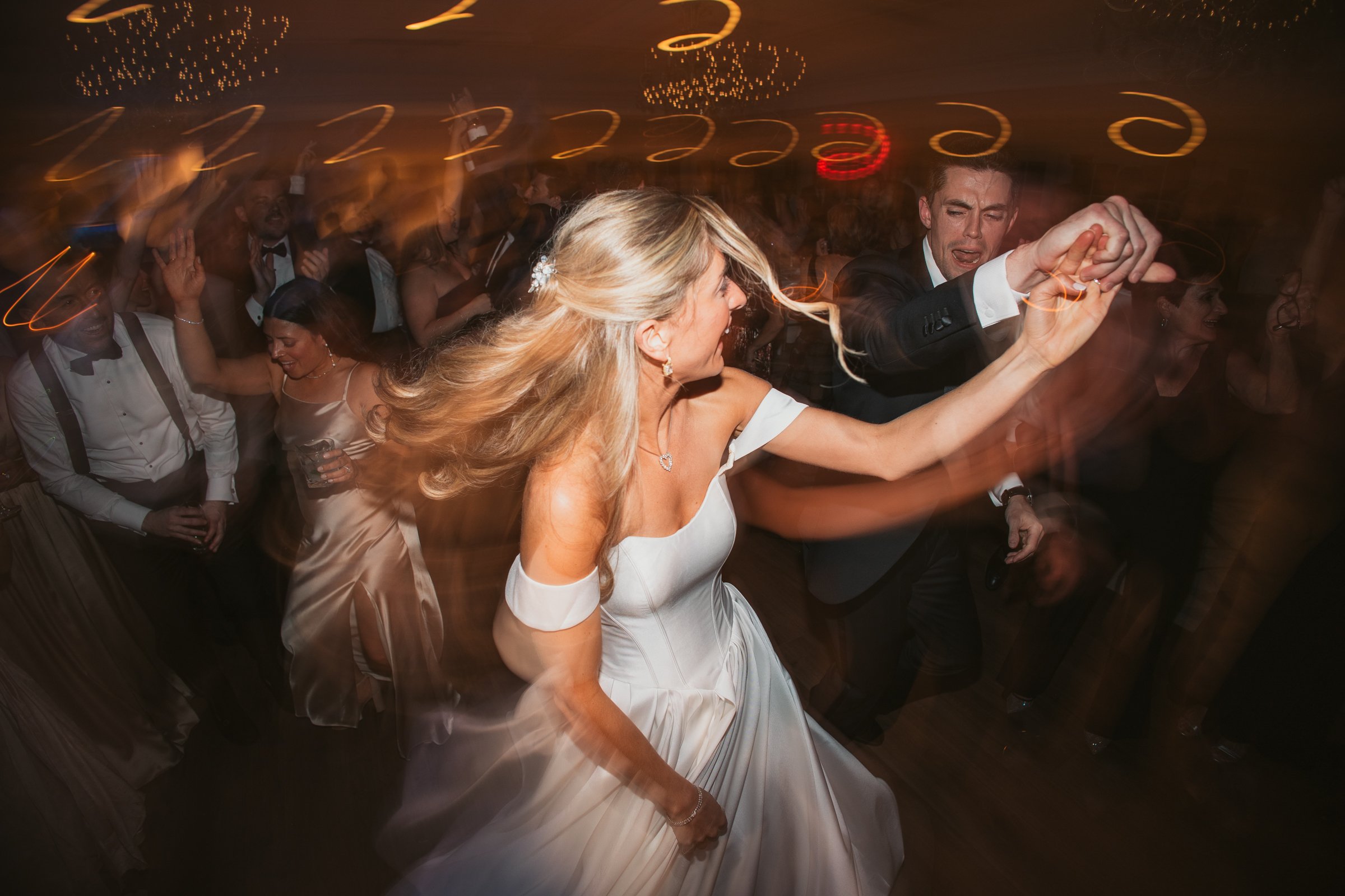 bride and groom dancing at reception