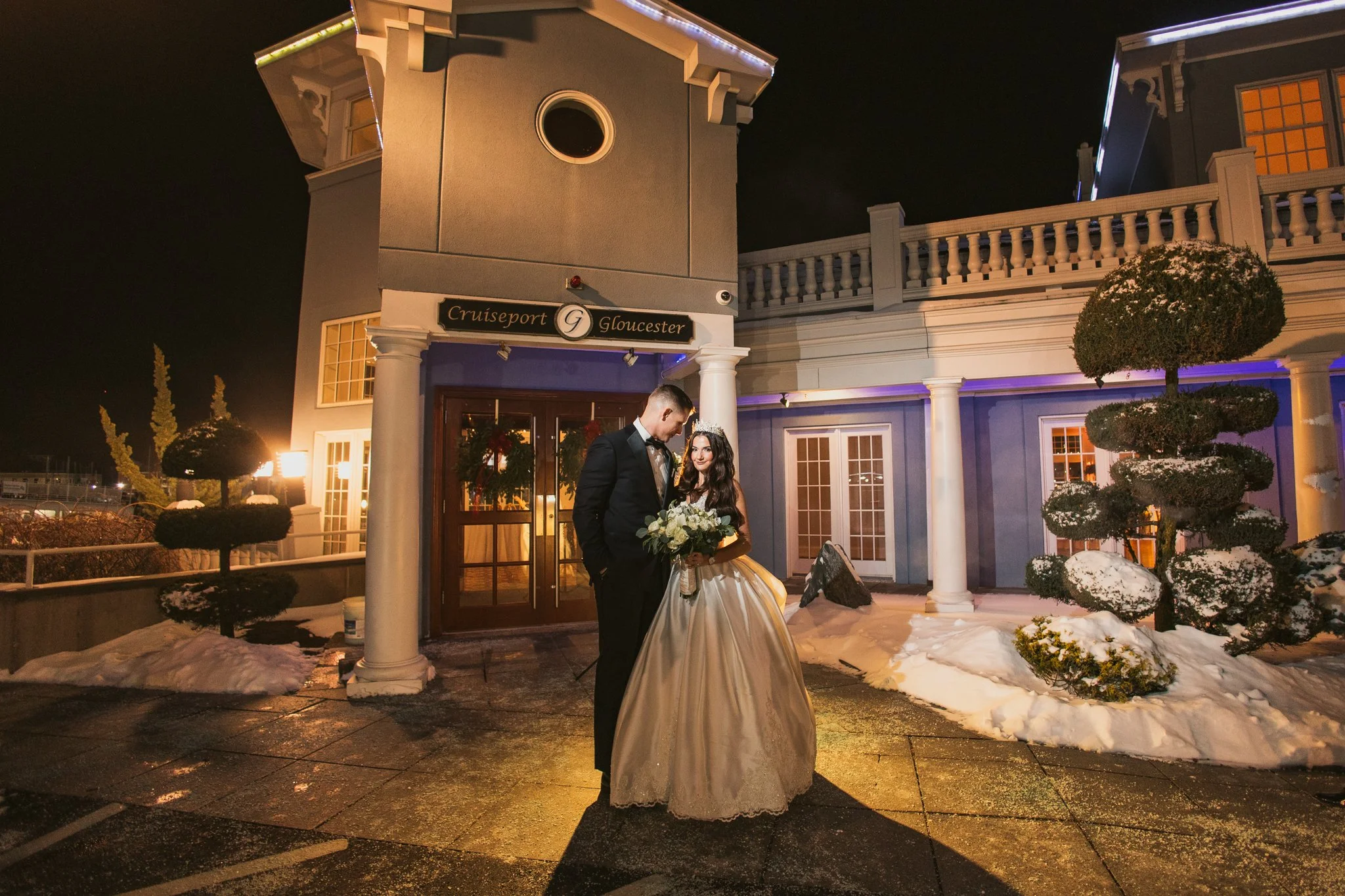 dramatic wedding night portrait in front of cruiseport