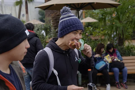 44A carnivore ripping turkey leg to shreds.jpg