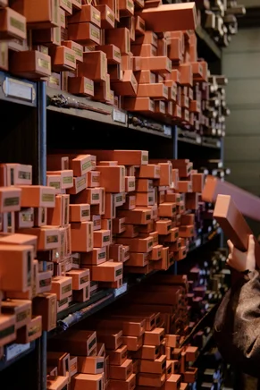 21A shelves filled to brim with replica wands.jpg