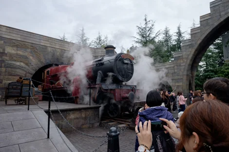 04B Hogwarts express train letting off some steam.jpg