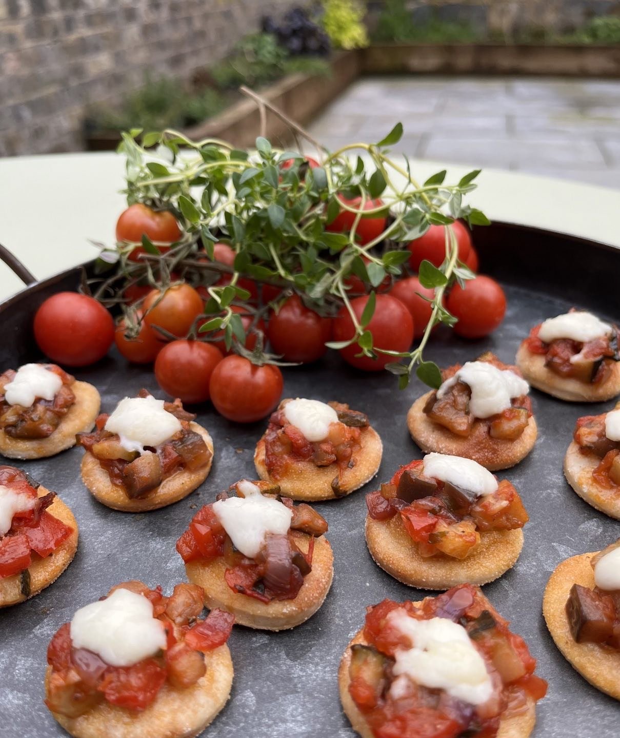 These were so cute they got a picture &hellip;sourdough pizzette topped with caponata and buffalo mozzarella . Simple but delicious!  #londoncatering #smallfood