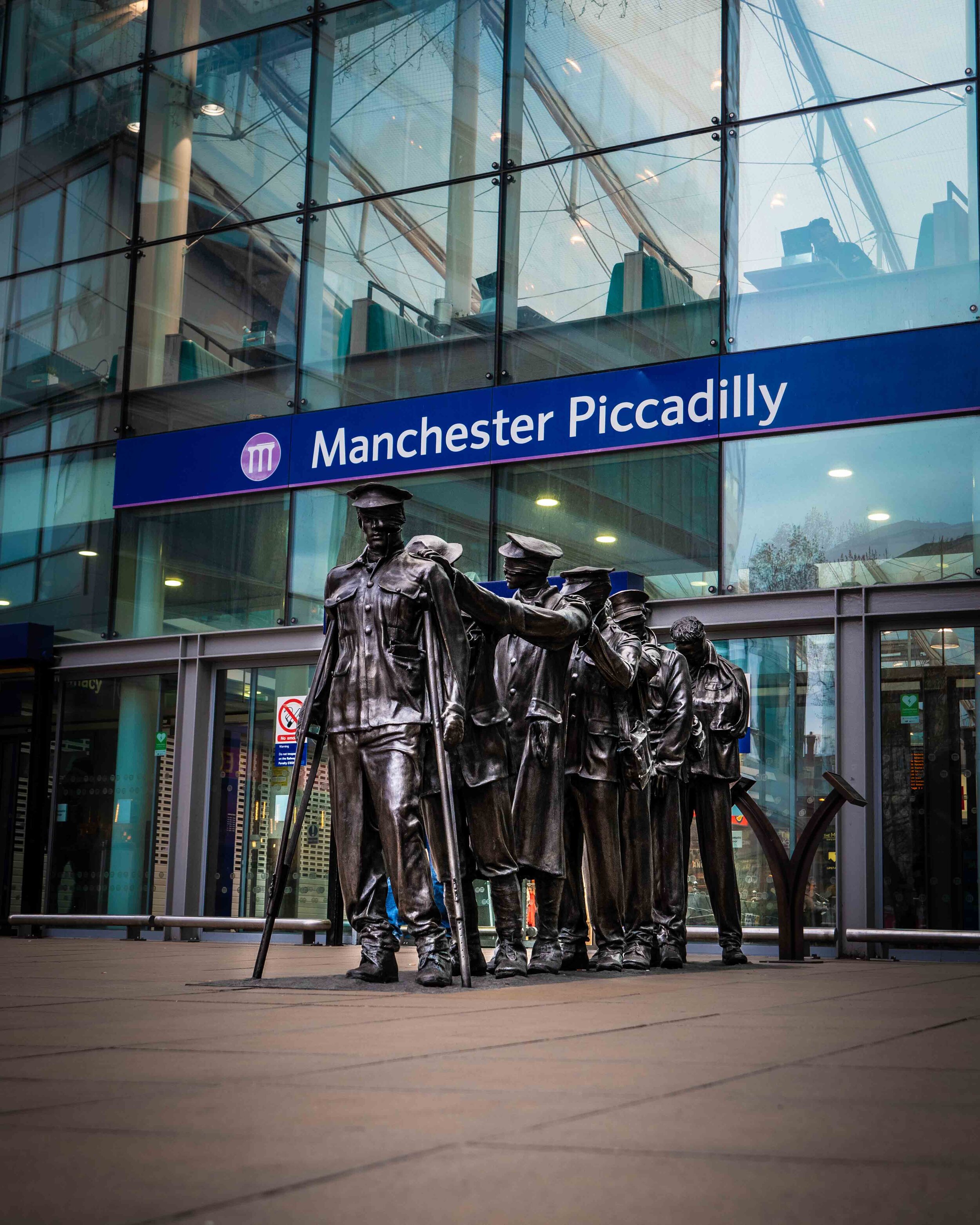 Blind statues outside of Manchester Piccadilly train station, free stock photography.jpg