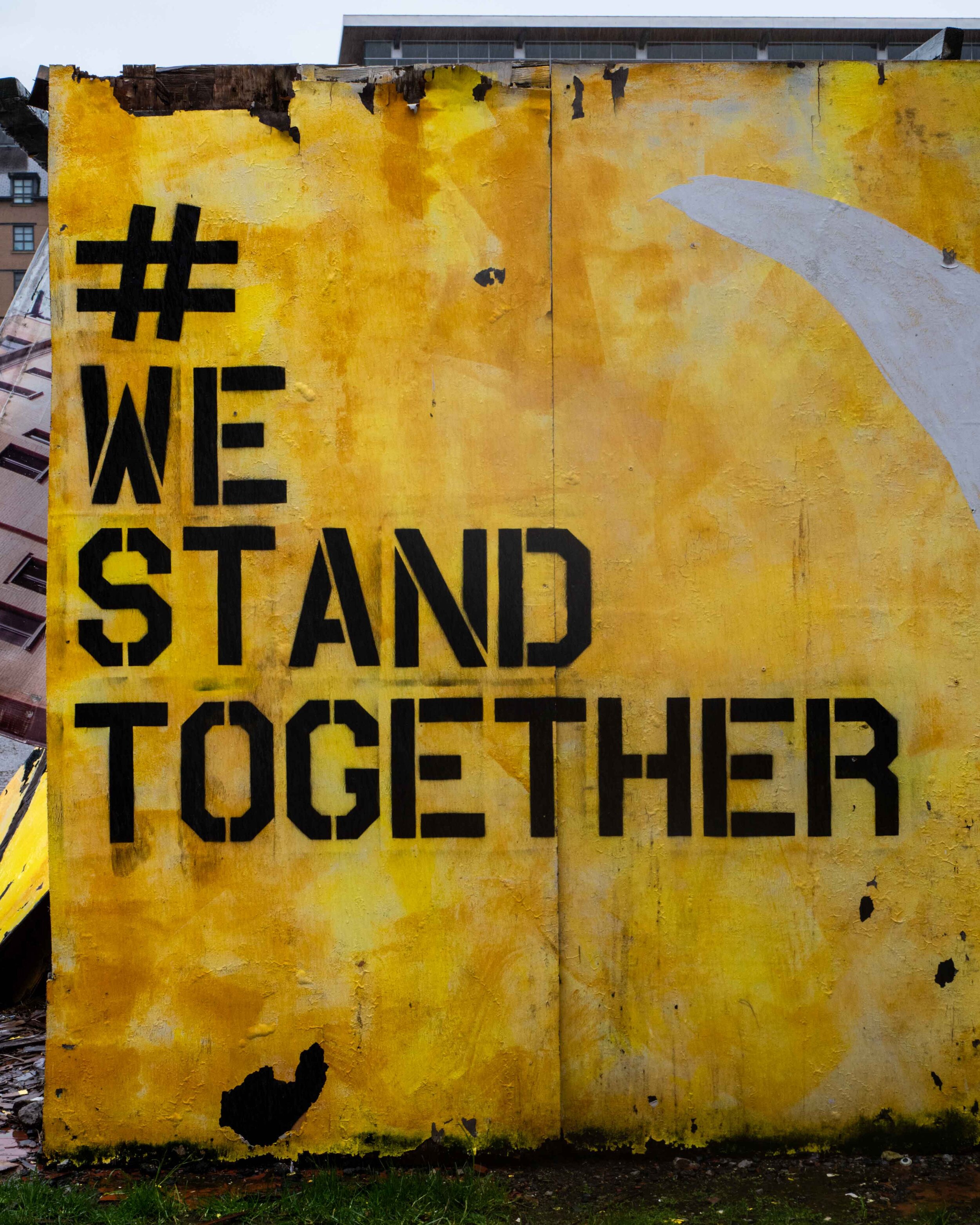 Writing on a wall that reads %22We stand together%22 manchester,  free stock photography.jpg