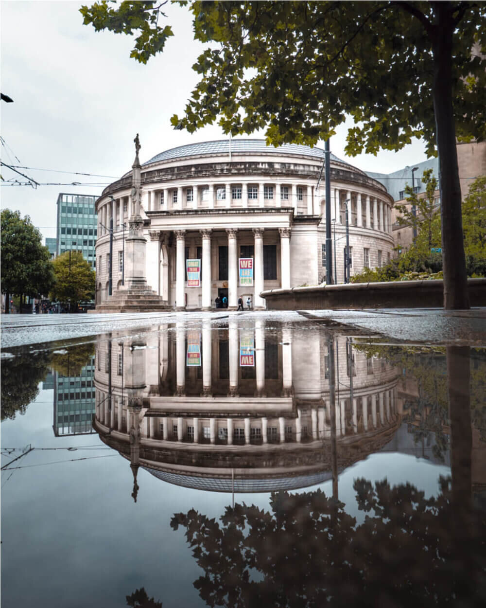 Manchester Central Library photography by Chris Curry showing a perfect reflection after a rainy day in the city