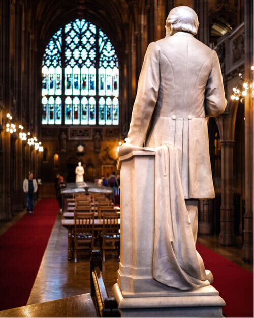 Photography of the statue inside of John Rylands Library in Manchester