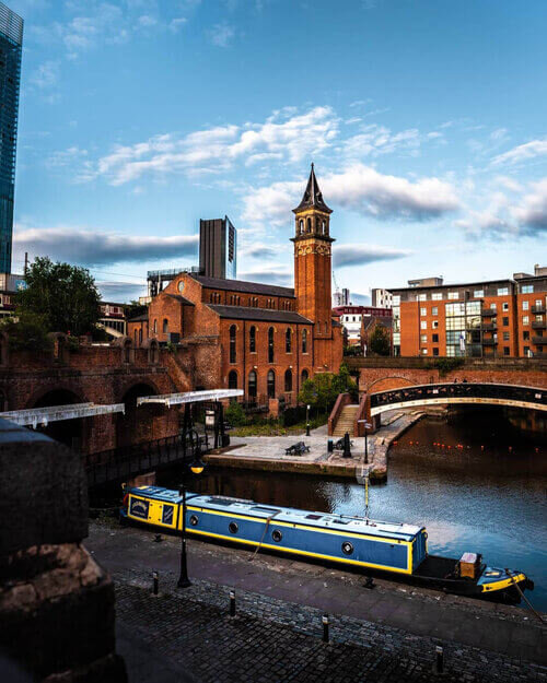 Iconic photography of Castlefield showing historic architecture and canal